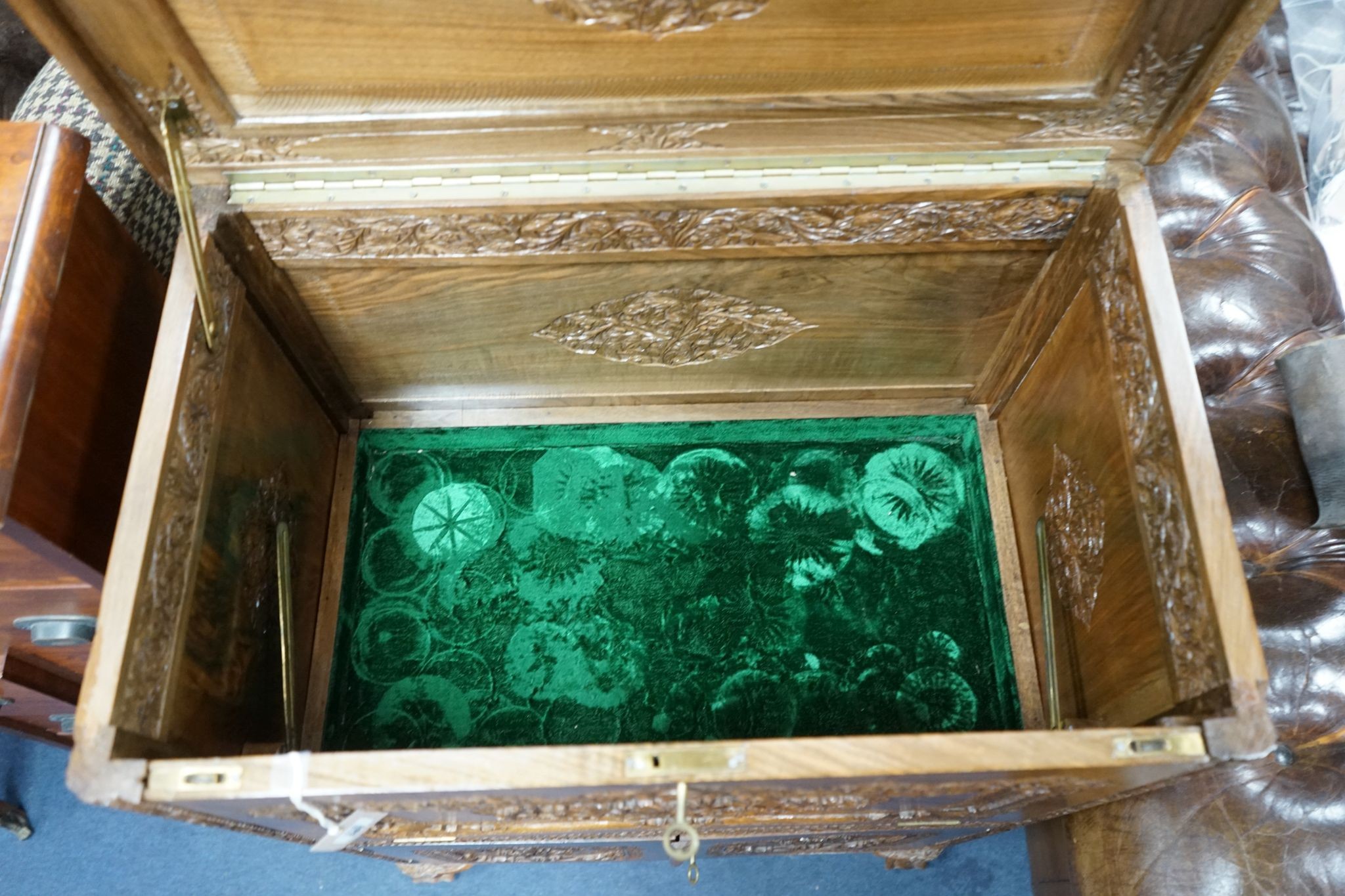 A Kashmiri carved hardwood cocktail cabinet, width 67cm, depth 42cm, height 96cm